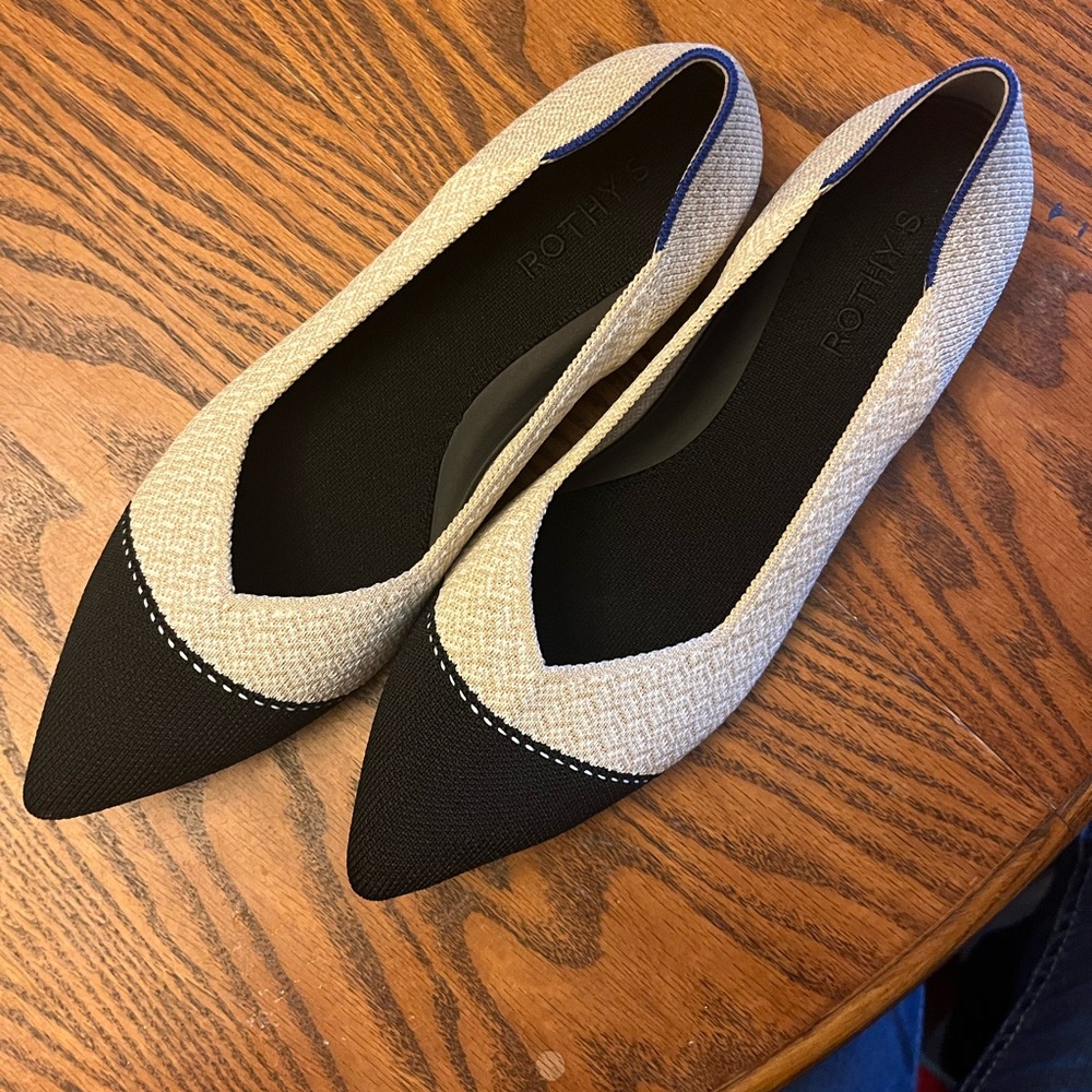 Rothy's Elegant Black and Cream Flats